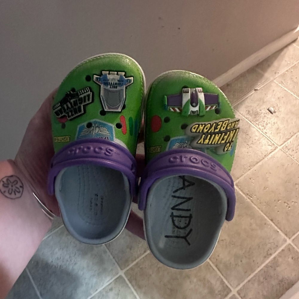 CROCS Kids Green and Purple Sandals with Space Theme